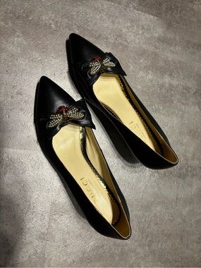 Gucci Black Pointed Leather Kitten Heels 
with Bejeweled Bee